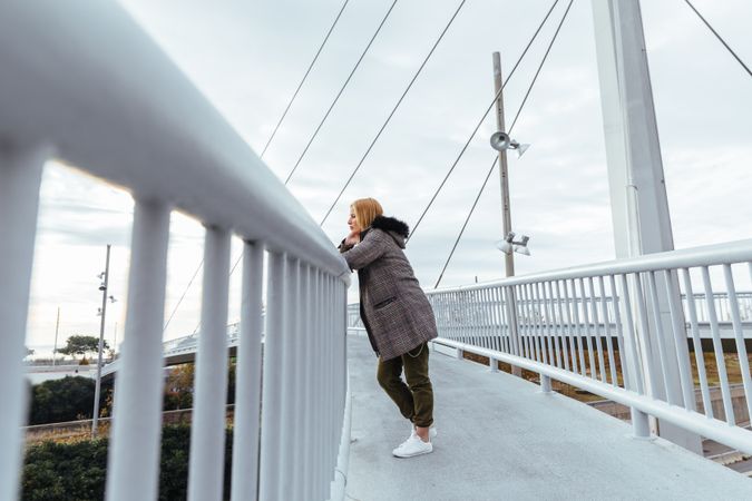 Blonde woman posing in the city