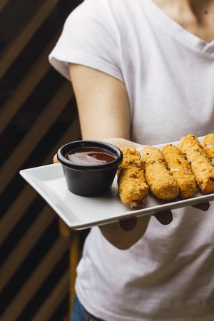 Chicken fillet in batter and red sauce
