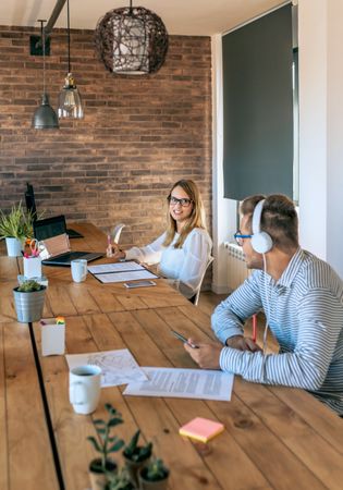 Coworkers talking in a coworking office