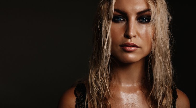 Close up of a female fashion model with wet look