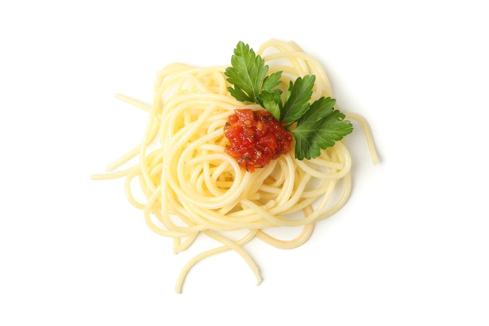 Tasty pasta isolated on plain background. Spaghetti food