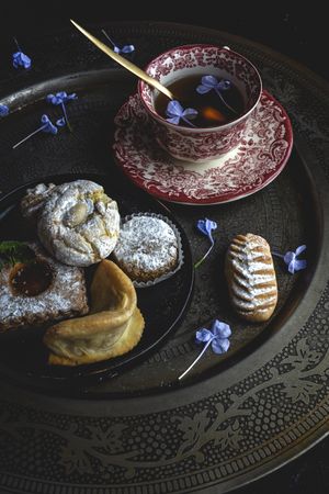 Traditional tea with mint and assorted Arab sweets