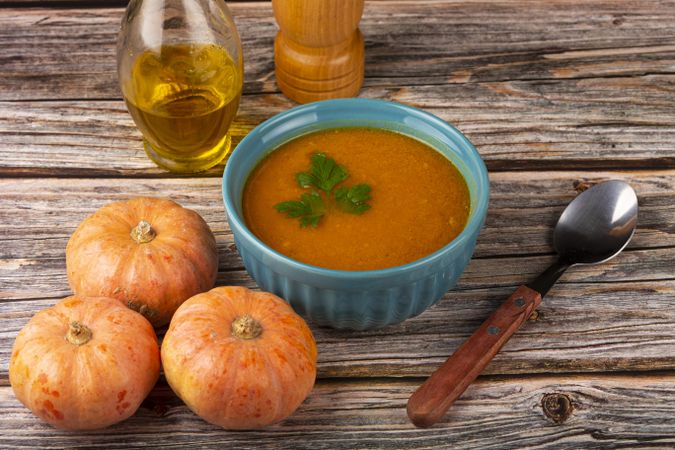 Delicious homemade pumpkin soup in bowl.