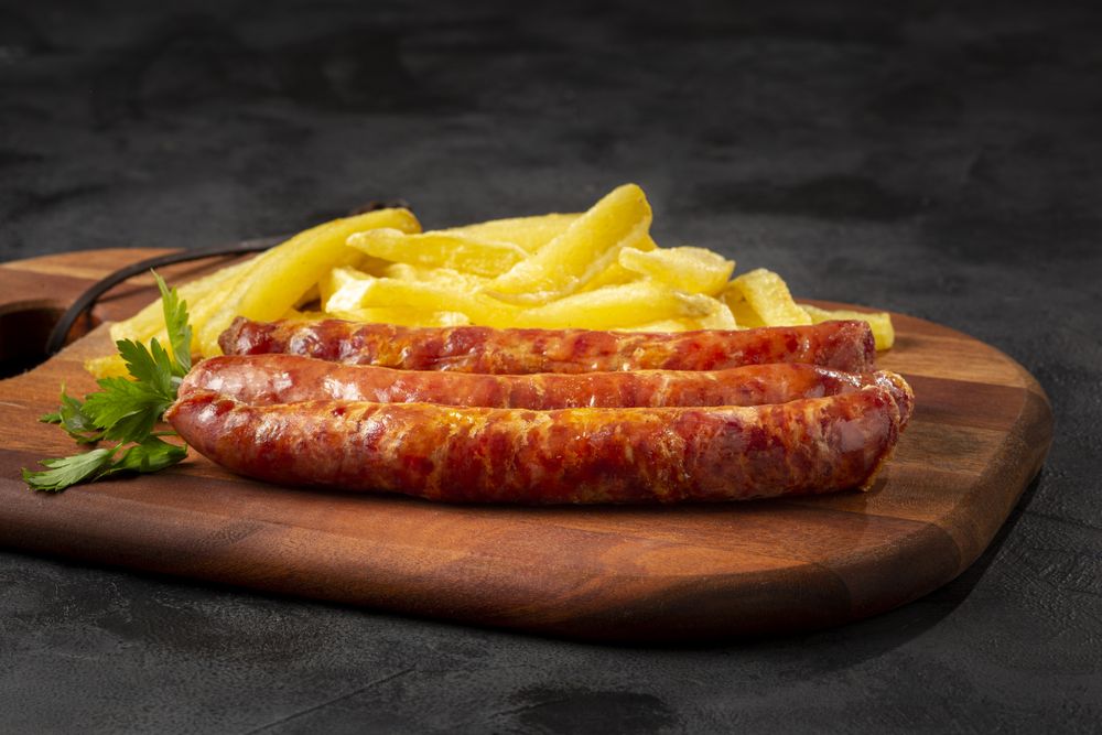 Grilled German sausage with french fries.