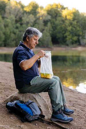 Man preparing to eat fruit