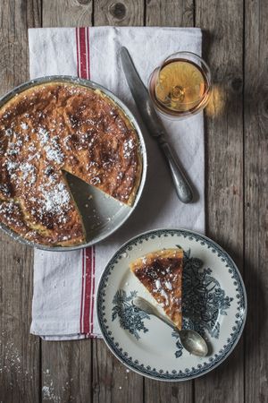 Cottage cheese pudding and glass of cognac