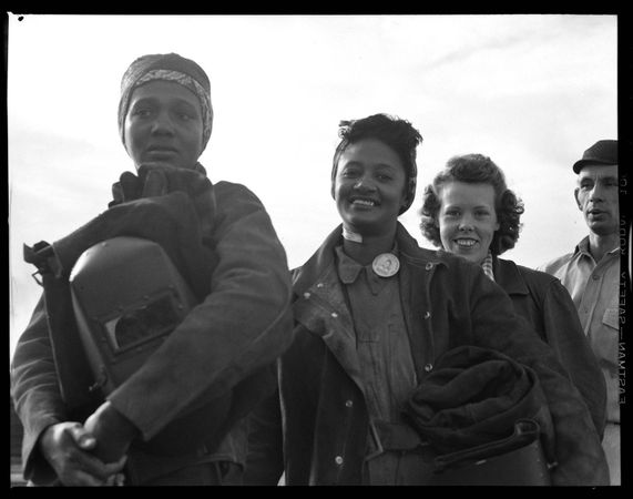 Women line up for paychecks at Richmond Shipyards, Richmond, CA, circa 1942
