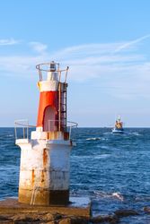 Lighthouse on rocky coastline