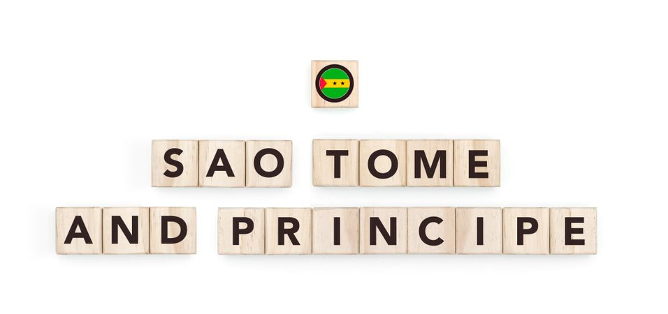Wooden blocks bearing the name and flag of Sao Tome And Principe. Sao Tomean and African Culture, national identity, travel, and geography in a copy space design.