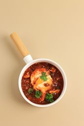 Shakshouka, eggs poached in tomato sauce