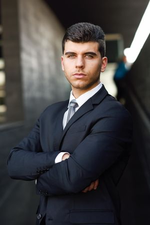 Man with blue eyes in suit and tie