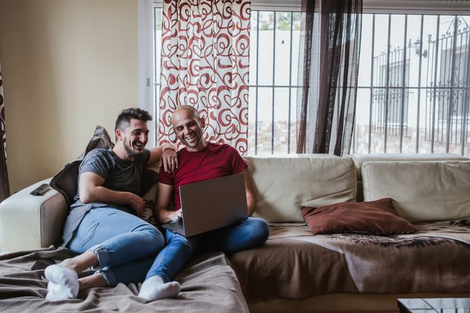 Gay couple with computer