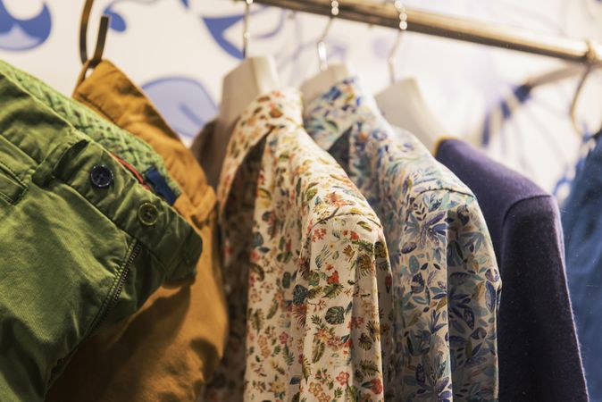 Clothes rack of floral dress shirt in fashion store