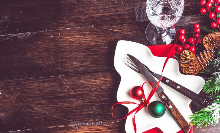 Christmas table with tree shaped serving dish with baubles