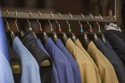 Clothes rack of dress shirts in fashion store 0vKjx5
