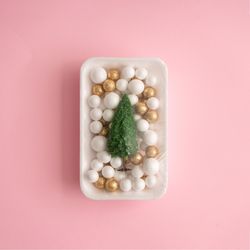 Christmas tree and ball decoration packed in plastic wrap