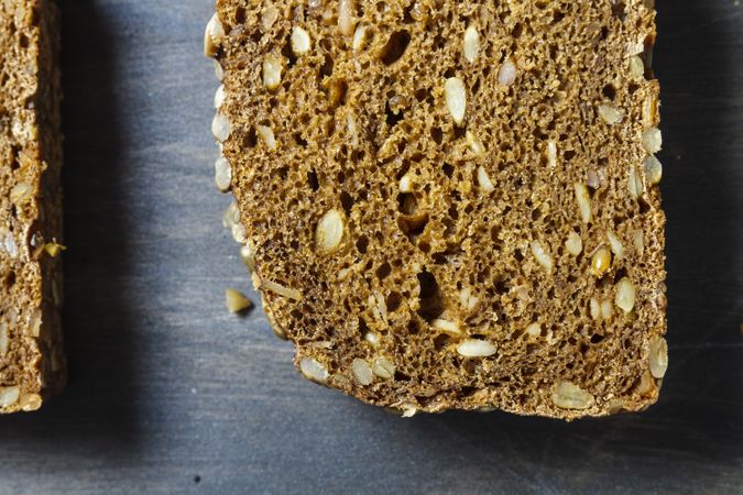 Sliced bread on wooden background