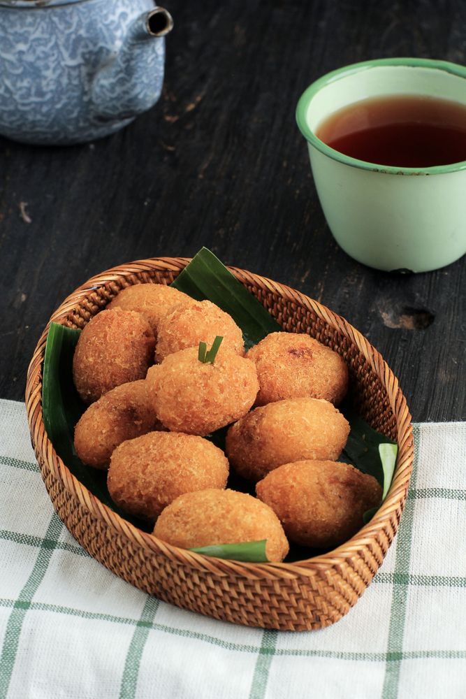 Fried grated cassava with sambal oncom filling