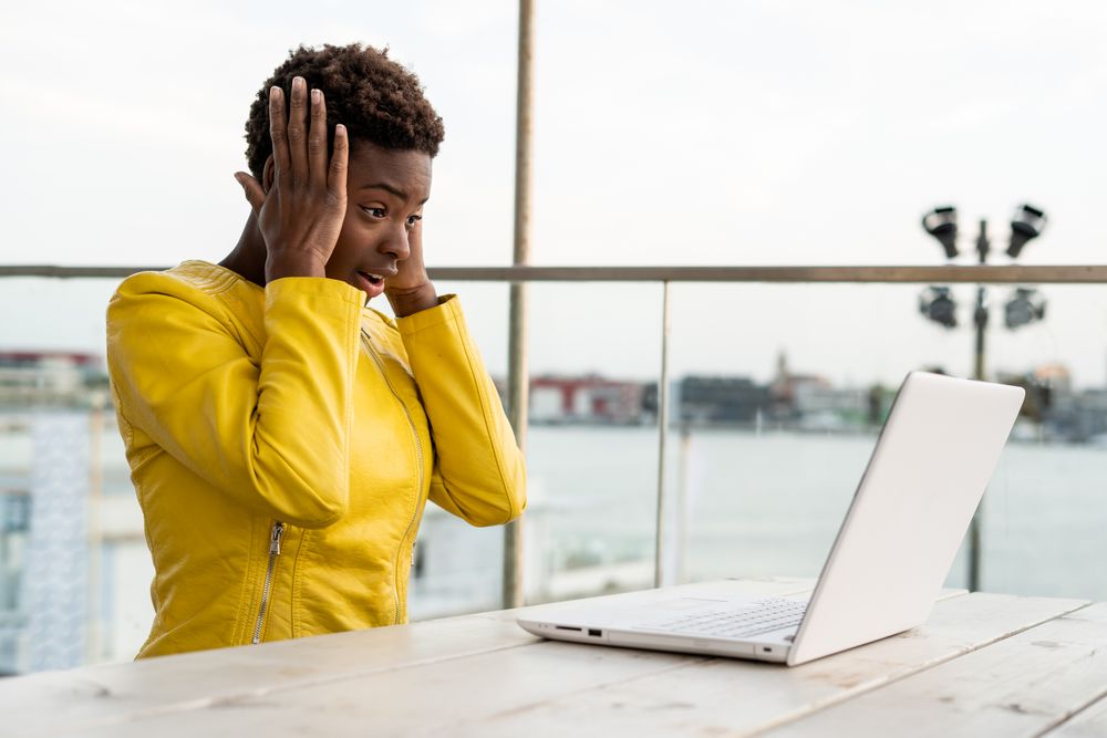 Female working on laptop at table