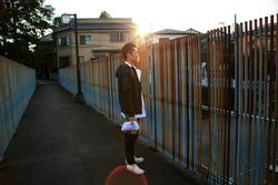 Man wearing sports jacket outdoor in the city