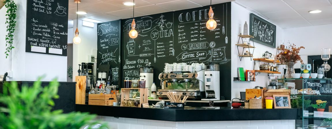 Empty cafe interior with coffee maker