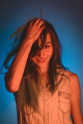 woman touching her hair