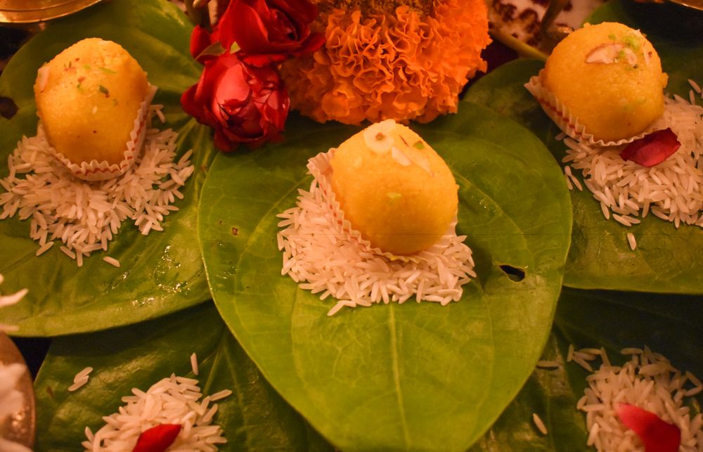 Indian dessert on bed of rice