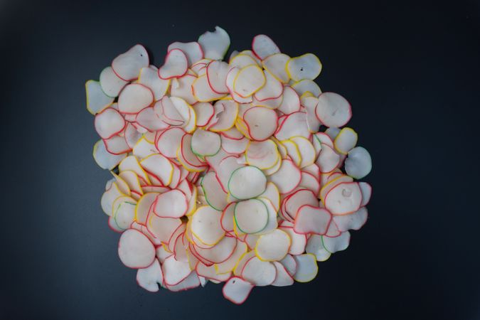 Thinly sliced, dried raw crackers ready to be fried