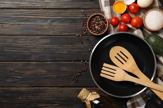 Composition with ingredients for cooking on wooden background, top view
