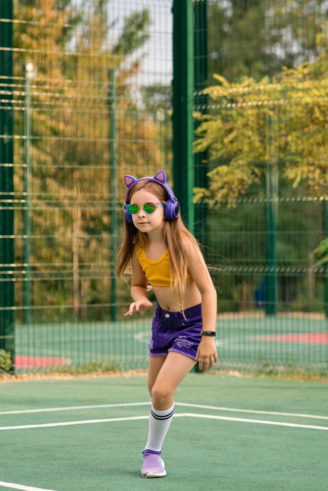 Playing on sports ground