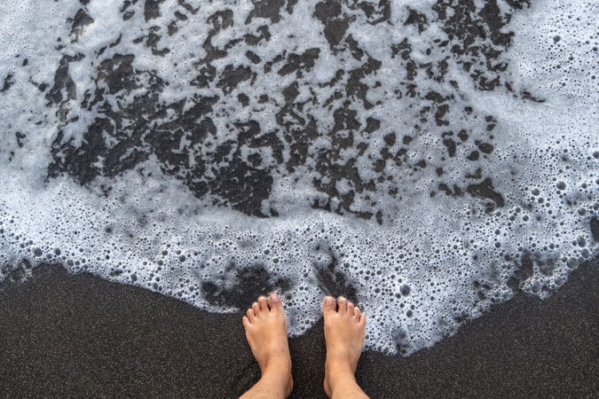 feet on sand beach