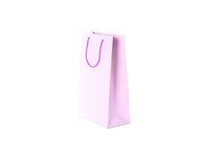 Purple paper bag isolated on blank background