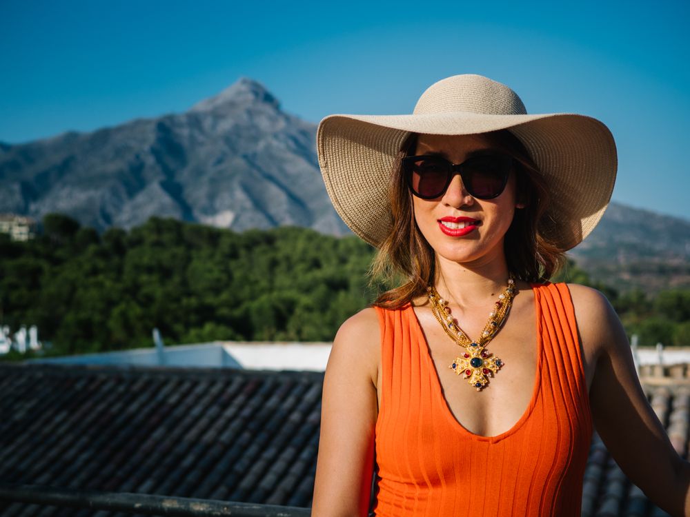 young elegant Chinese woman at mediterranean scenario