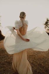 Woman in dress posing on nature