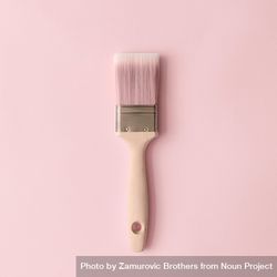 Paint brush and pastel pink background 0LPDV0