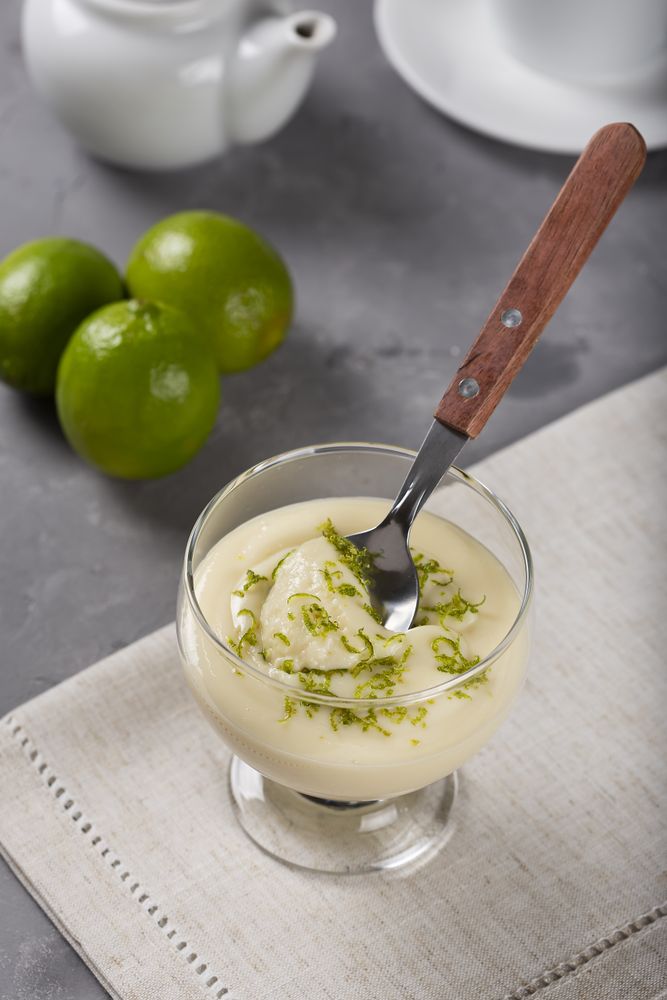 Lemon mousse with lemon zest on top.