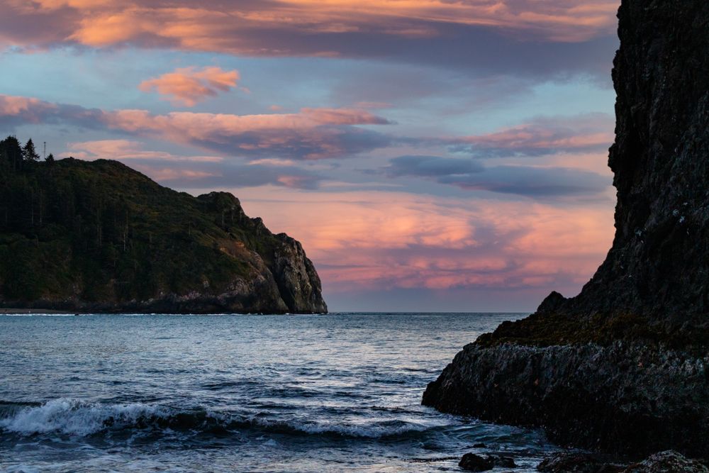 Rocky coast under colorful clouds