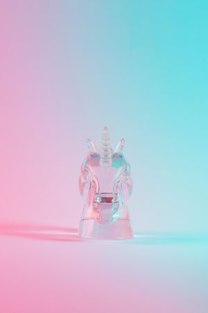 Unicorn figure in vibrant bold gradient holographic colors