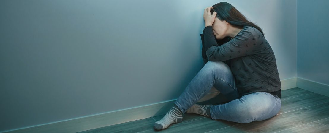Unrecognizable woman  with hands in head