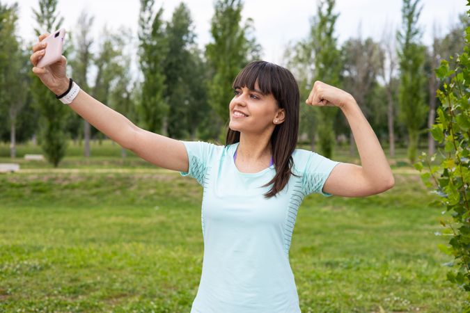 Sport woman taking a selfie on fitness training outdoors
