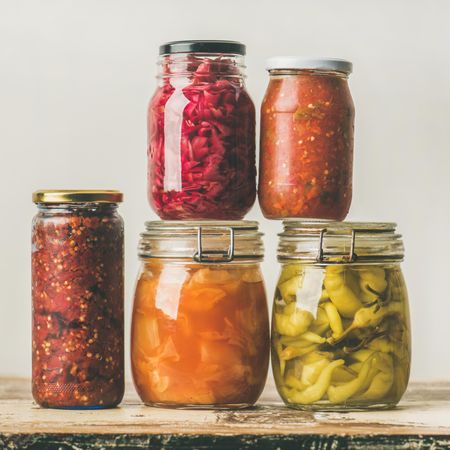 Jars of pickled and fermented food, and relishes