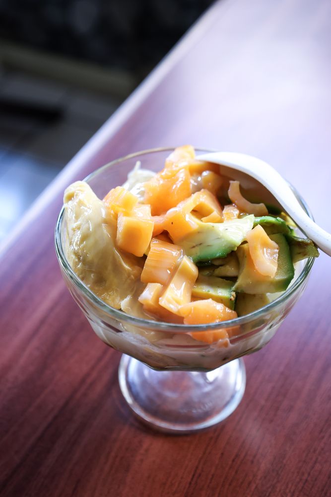 Es Teler Durian, Indonesian Fresh Dessert made from Coconut Milk with Jackfruit, Avocado, and Durian Topping.
