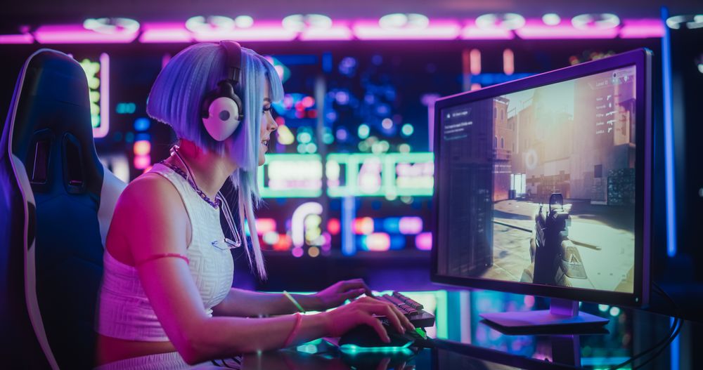Female Online Gamer Playing a Shooter Video Game in a Futuristic Cyberpunk Room.