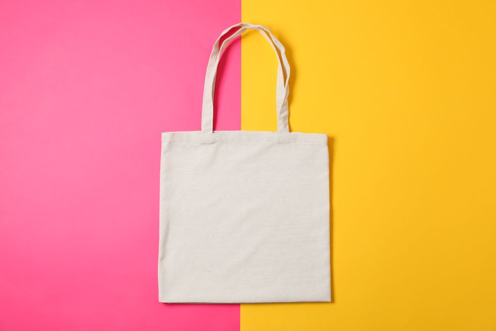 Eco bag on two color background, space for text