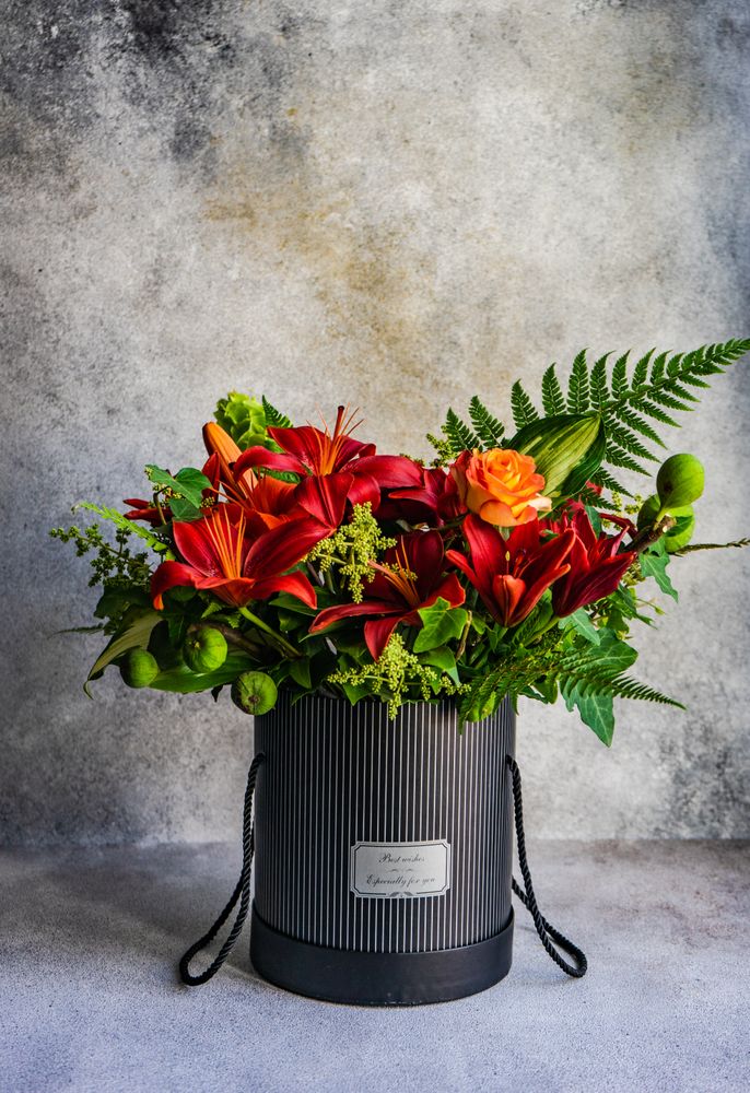 Red and orange flower composition