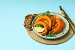 Concept of tasty homemade dish - baked pumpkin