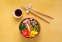 Healthy lunch bowl with lime slice on top