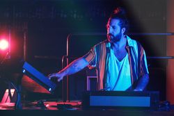 DJ playing music in nightclub