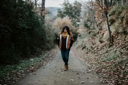 Young female hiking in forest