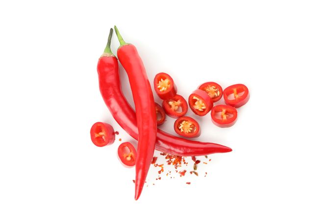 Tasty red chilli peppers isolated on blank background